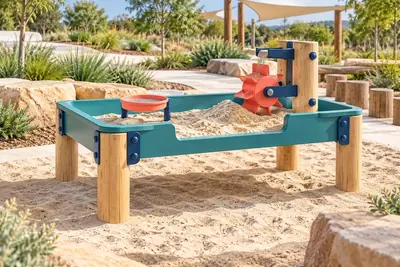 AI concept visual: one original ground-level playground sand activity station, sand table with accessible open side, timber legs, navy fixings and teal rim, small sieve and simple turning sand.